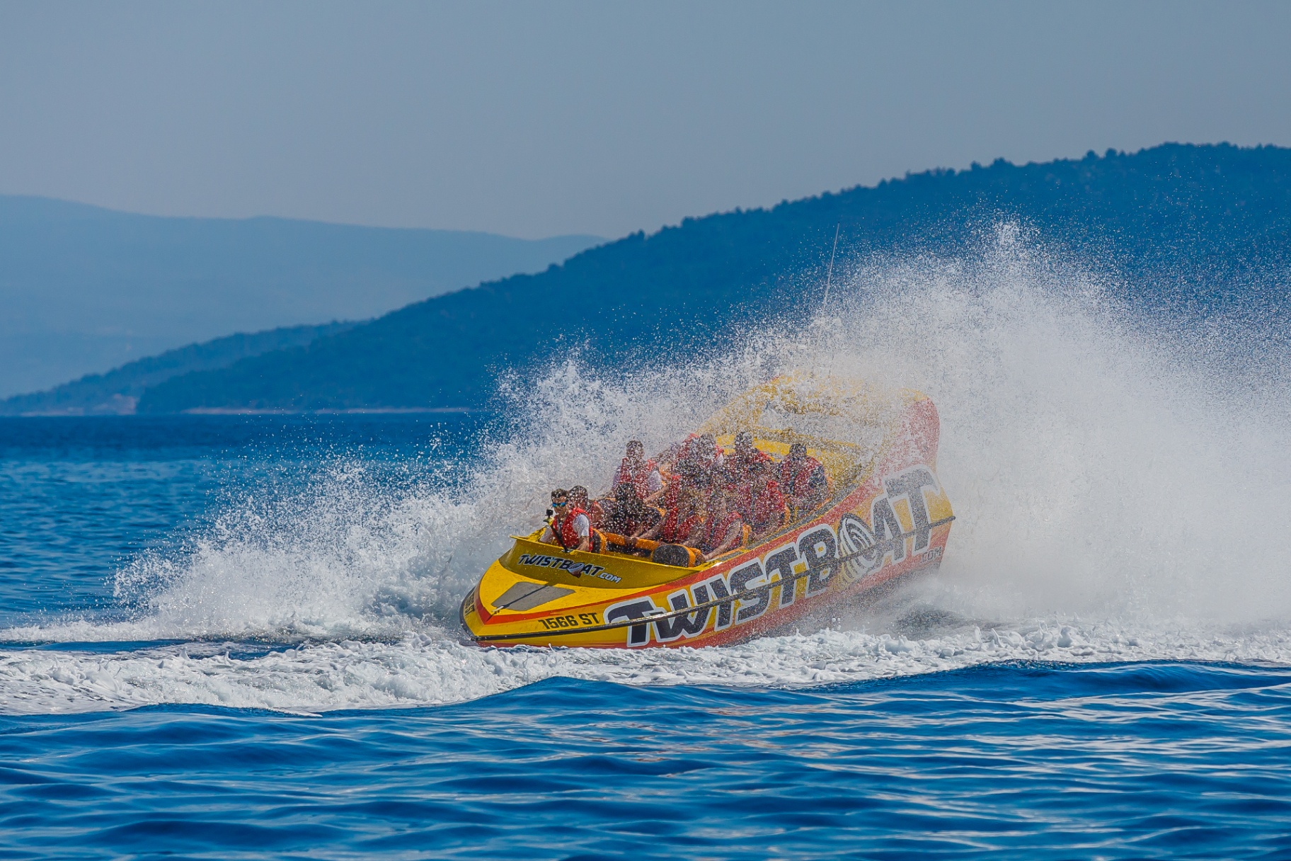 Twistboat speeding across the Adriatic